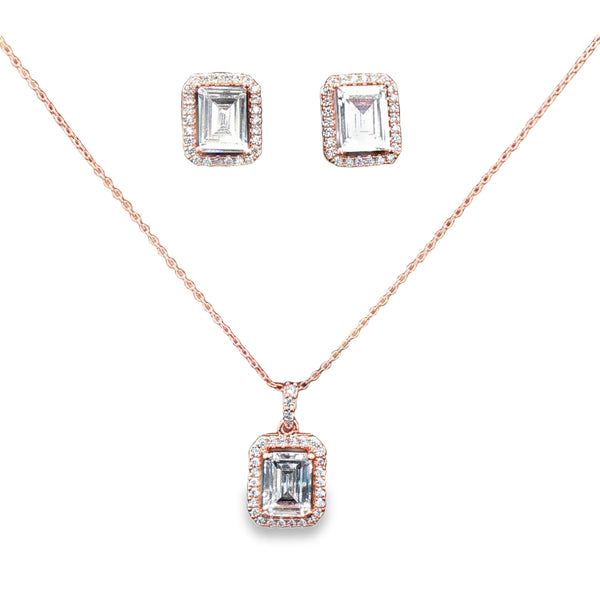 Premium rose gold emerald-cut CZ pendant necklace set with matching stud earrings.