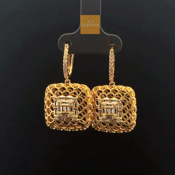 Elegant Gold Earrings with Intricate Design