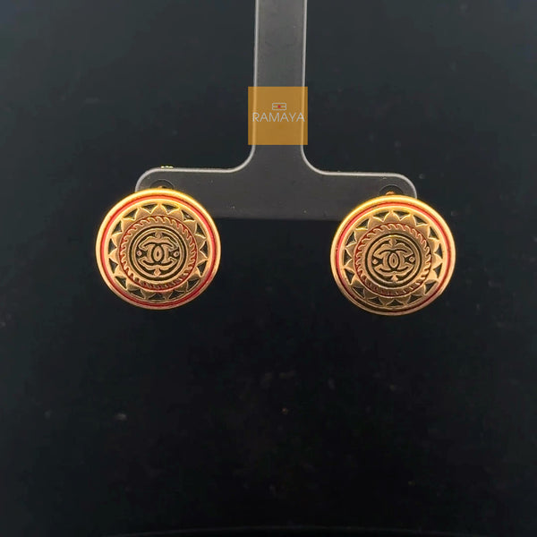 Elegant Gold Earrings with Intricate Design