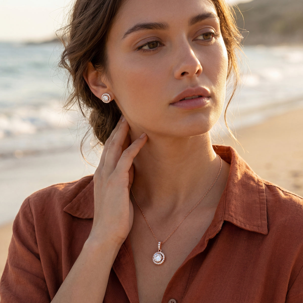 Premium cubic zirconia jewellery set with rose gold pendant necklace and matching CZ earrings for women.