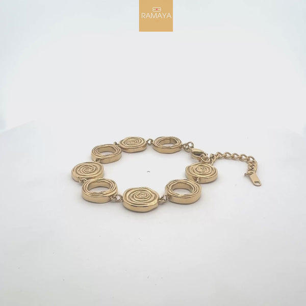 Elegant Gold Spiral Bracelet