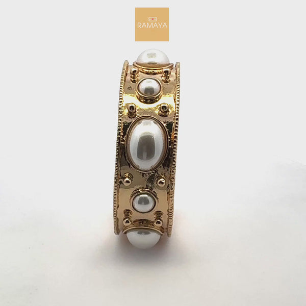 Elegant Gold and Pearl Cuff Bracelet