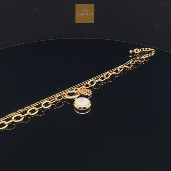 Elegant Gold Bracelet with Charm