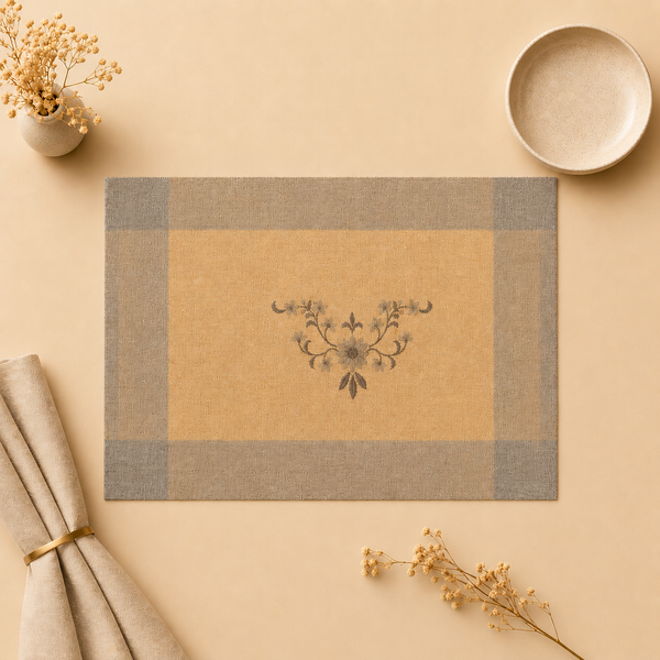 Placemat with floral design on a beige surface with decorative elements.